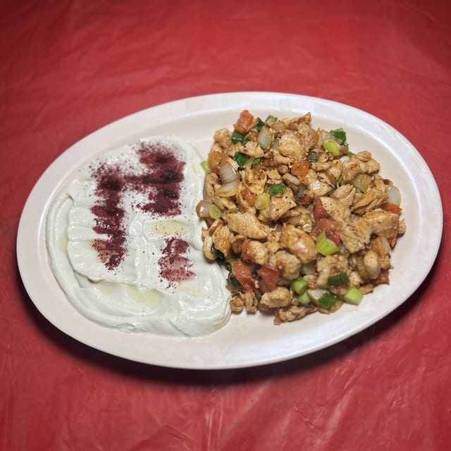 Chicken Mogulgul with Hummus and Pita Bread.